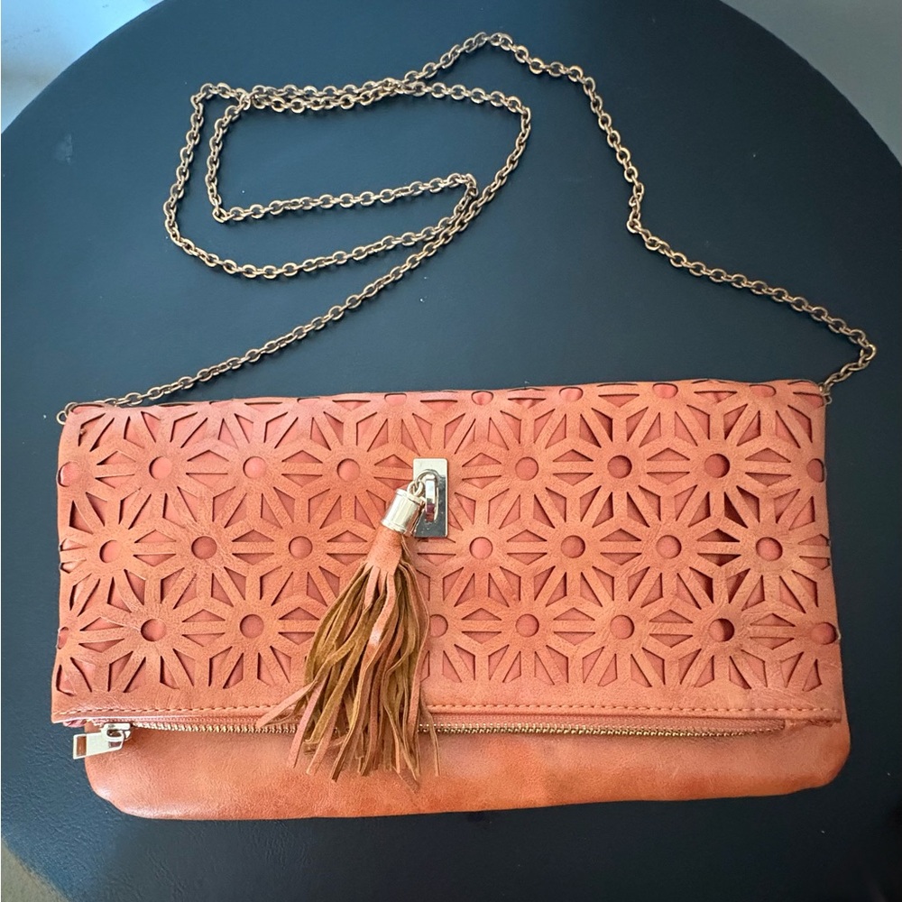 Burnished Copper Convertible Bag. MMS. Cut-Out Daisy Details. Many Ways to Style